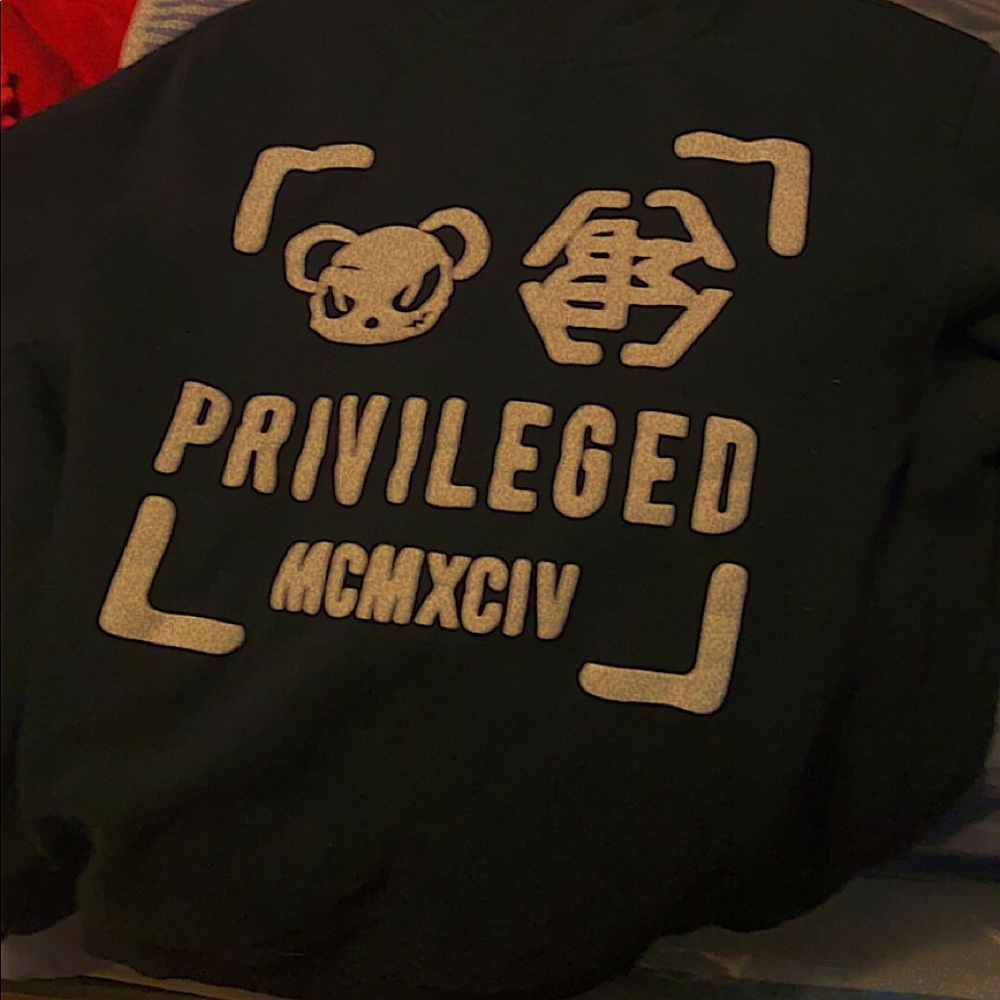Black Sweatshirt with White Lettering.